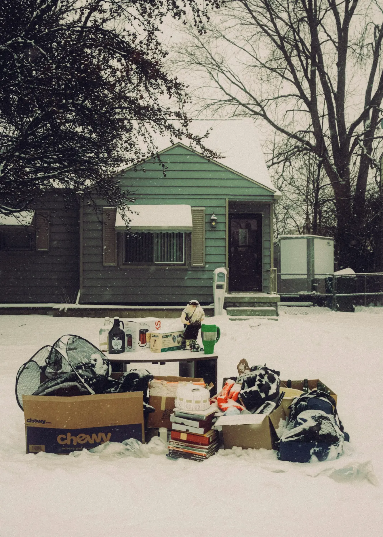 hoarded-home-cleanup decluttering moving boxes
